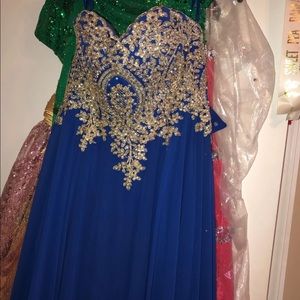 A long blue pageant/ prom dress. Only worn once.